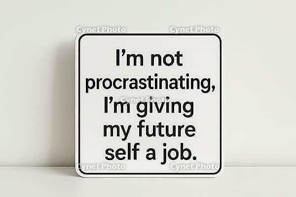 White sign with black text humorously claiming that procrastinating is actually giving future self a job, AI generated [IBR125421191]