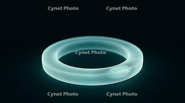 Abstract glowing teal cyan cross-sectional ring visualization representing cardiac MRI T2 tissue mapping, localized bright zone, dark background, clinical macro photography, AI generated [IBR125421221]