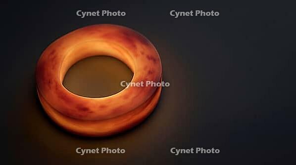 Abstract glowing amber red cross-sectional ring visualization representing cardiac MRI T1 tissue mapping, dark background, medical imaging concept, clinical macro photography, AI generated [IBR125421270]