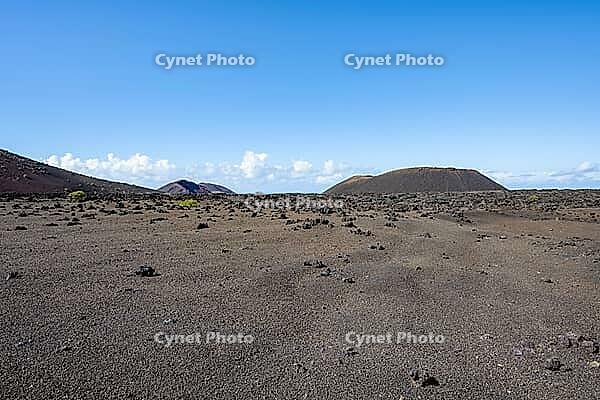 Volcanic landscape with volcanic craters and lava fields, Timanfaya National Park, Lanzarote, Canary Islands, Spain [IBR125423490]