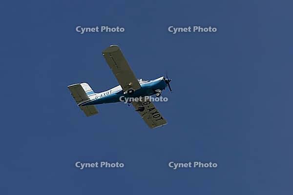 MS-893A Rallye Commodore 180 light aircraft flying in a blue sky, England, United Kingdom [IBR125423495]