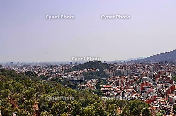 Aerial view of beautiful city Barcelona in sunny summer weather [IBR125436248]