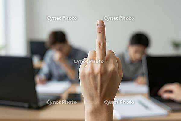 Workplace rebellion with rude middle finger gesture in corporate office shows toxic employment culture, job burnout and extreme employee frustration, foreground hand displaying offensive sign towards camera, unfocused colleagues sitting at desks in backgr [IBR125446416]