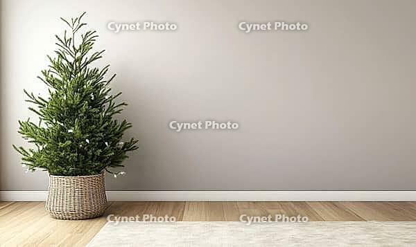 Living room with light grey walls, simple green Christmas tree in a basket, AI generated [IBR125472247]