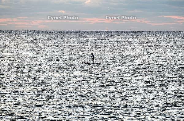 A man paddles with his stand up paddle in front of Tortoli beach, Sardinia, 29.09.2026, Tortoli, Italy [IBR113453105]