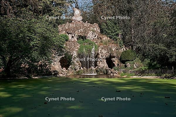 Grotto and artificial waterfall with pond in Citadelpark - Ghent, Belgium [IBR125492326]