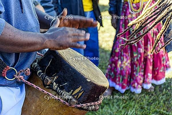 Atabaque of African origin played in a presentation of Brazilian popular culture [IBR125492400]