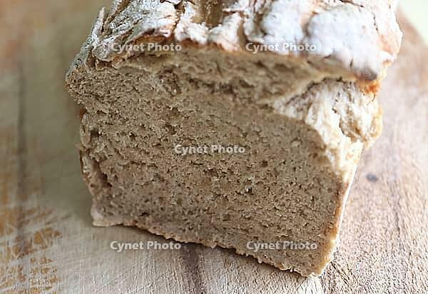 Selective focus view at a fresh baked crusty bread [IBR125501599]