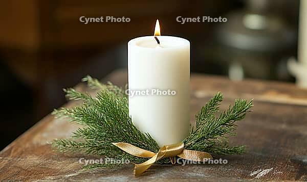 Single white candle with a small brass bell and fir, AI generated [IBR125502180]