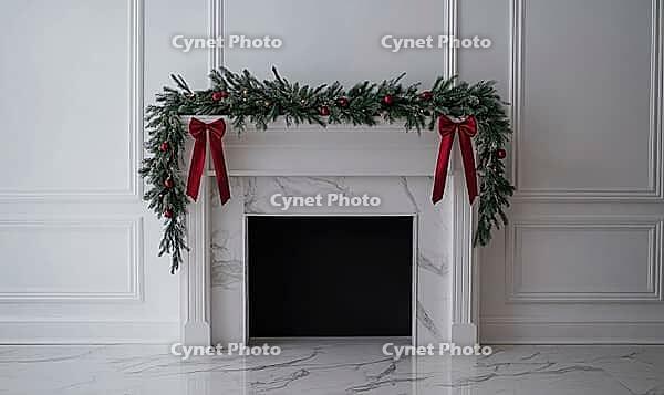 White mantle decorated with a simple pine garland and a few red baubles, AI generated [IBR125502189]