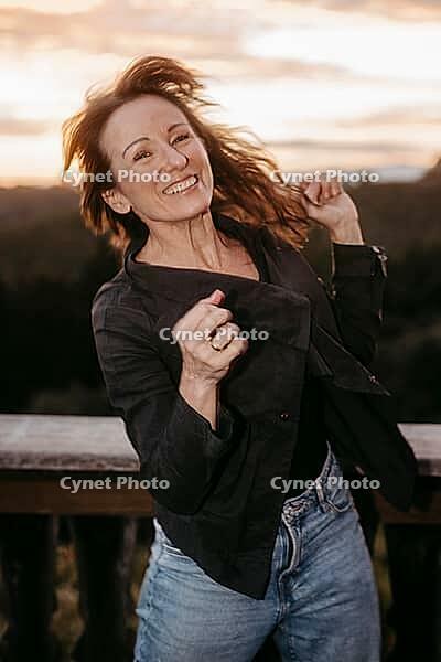Happy, dynamic woman, 45+, moving [IBR125521104]