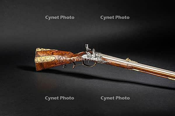 A historic stone castle box of exquisite value - ornately engraved rifle, decorated with elegant materials, traditional craftsmanship, and timeless elegance [IBR125527094]