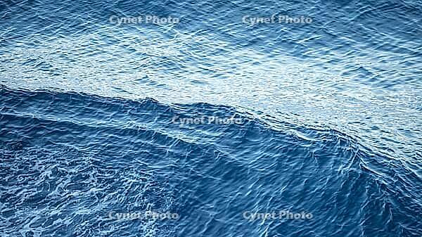 Glistening and shimmering blue ocean surface background view from the cruise liner [IBR125536399]