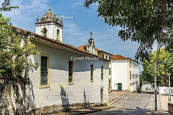 Facade of a historic church in Baroque style in the streets of city of Olinda in Pernambuco, Brazil [IBR125557535]