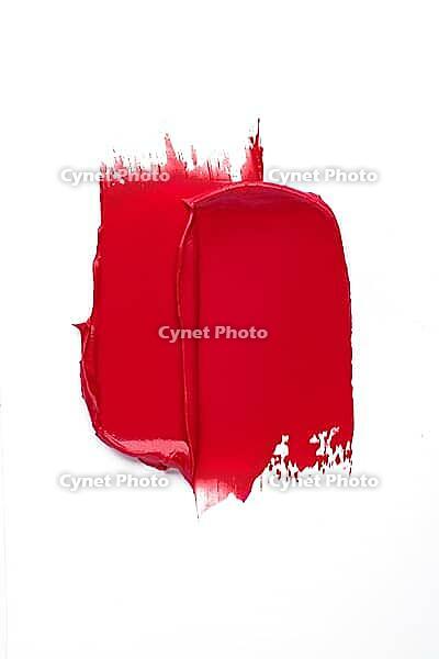 Double Red smear swipe isolated on white background texture beauty lipstick swatch [IBR125557555]
