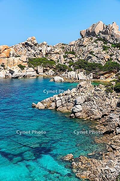Sardinia white rock coast in Capo Testa and turquoise water on a sunny day, in Italy [IBR125557584]