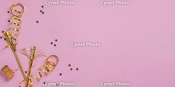 Festive background with golden serpentine, confetti and sparkles. Festive layout frame with place for text. Party, new year, birthday concept [IBR125557586]