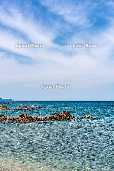 Sa Figu beach with rocks of turquoise water in Sardinia, Italy [IBR125557613]
