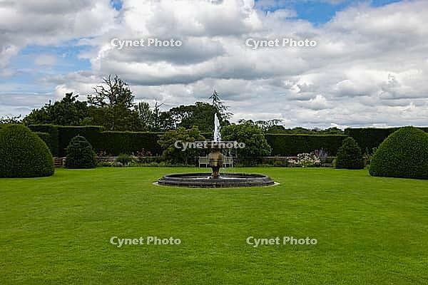 Fountain at Powis Castle garden in Welshpool, Wales, United Kingdom, Powis is a Welsh castle built by a Welsh prince [IBR125557619]