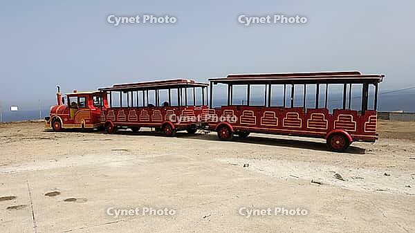 Asinara, Italy, August 11 2021. One of the tourist trains that go around the island during the summer [IBR125566076]