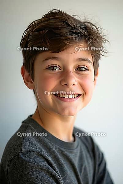 Studio portrait of a cheerful preteen boy with brown hair, exuding Happiness and confidence, AI generated [IBR125592679]