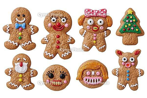 A collection of decorated gingerbread cookies shaped like people, a reindeer, and a Christmas tree, with colorful icing and candy details. AI generated [IBR125592706]