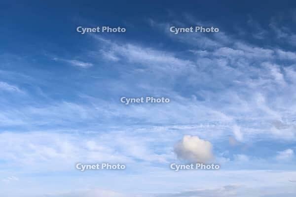 Stunning cirrus cloud formation panorama in a deep blue summer sky seen over Europe [IBR125606087]