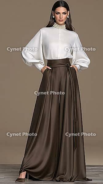 Elegant woman in white balloon sleeve blouse and chocolate brown satin wide leg palazzo pants. AI generated [IBR125621282]
