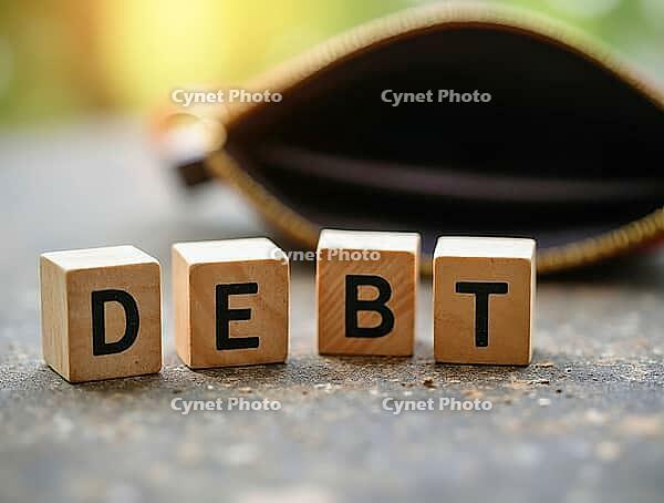 Wooden alphabet blocks spelling the word debt are placed near an empty wallet on a dusty surface, AI generated [IBR125621292]