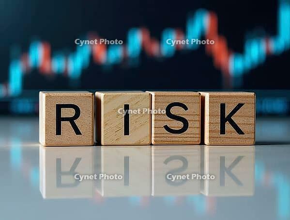 Four wooden cubes spelling risk reflecting on a table with blurred stock market chart in background, AI generated [IBR125621294]