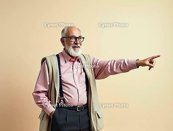 Cheerful elderly professor pointing aside with index finger while smiling and wearing suspenders and eyeglasses, AI generated [IBR125621318]