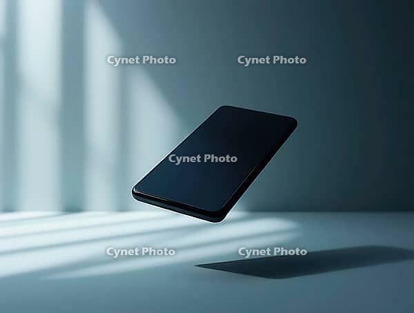 Sleek, black smartphone hovers in an empty room, illuminated by dramatic lighting from a window, creating a minimalist yet striking composition, AI generated [IBR125636869]