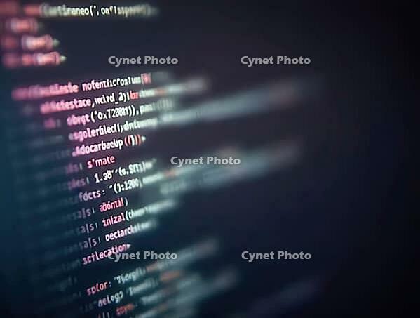 Shallow depth of field highlighting lines of code on a computer monitor, representing software development and programming, AI generated [IBR125636948]