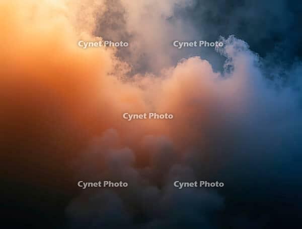 Smoke and fine dust particles illuminated by a single warm-toned light source creating a surreal and evocative atmosphere, AI generated [IBR125636960]