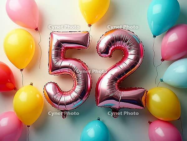 Pink foil balloons forming number 52 surrounded by colorful balloons, celebrating a fifty-second birthday, AI generated [IBR125645878]