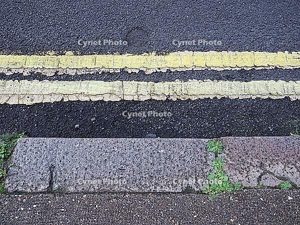 Double yellow line no waiting or parking at any time sign [IBR125654754]