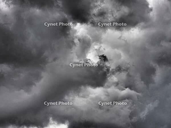 Dramatic stormy sky with dark clouds useful as a background [IBR125654770]