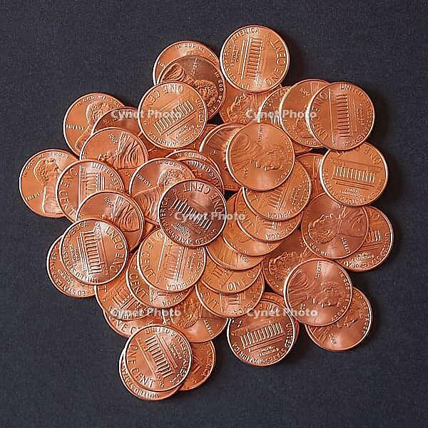 One cent wheat penny coin currency of the United States over black background [IBR125654778]