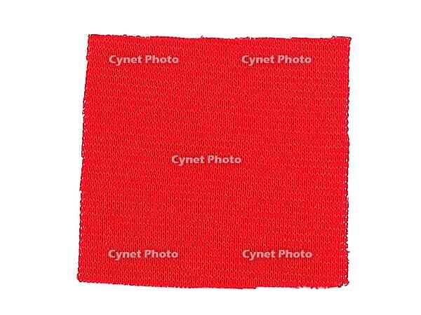 Red fabric swatch over a white background [IBR125654808]