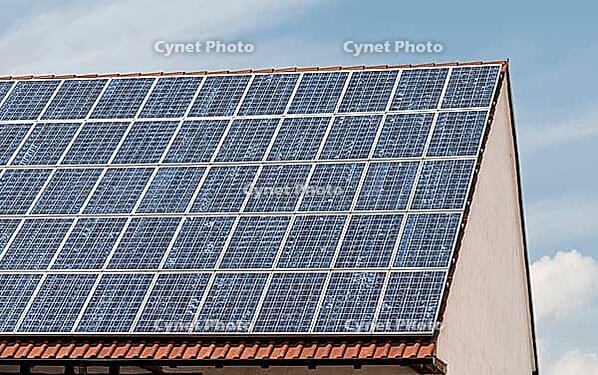Photovoltaic system on a tiled roof, Rhineland-Palatinate, Germany [IBR125657387]