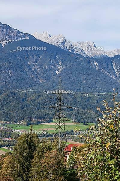 Karwendel Mountains, power pole and forest with Inntal valley, Volders, Tyrol, Austria [IBR125657432]