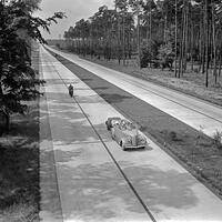 A family in a Ford V8 on the Autobahn between Berlin and Stettin, Germany 1930s. [UIG110170968]