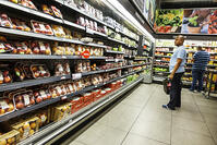 Woolworths supermarket food shelves produce fruit man looking [UIG110171048]
