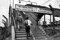 Sign showing segregation under the Apartheid laws in South Africa. 1975. Photograph of segregational signs at a South African train station. (Photo by: Universal History Archive/Universal Images Group via Getty Images) [UIG110171060]
