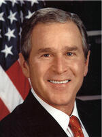 George Walker Bush (born 1946) 43rd President of the United States  2001-2009. 46th Governor of Texas  1995-2000.  Head-and-shoulders portrait with stars-and-stripes in background. American Politician Republican. [UIG110171073]