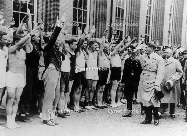Adolf Hitler inspecting athletes, Germany, 1933. [UIG110171012]