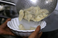 Yichang, Hubei: Traditional handmade dumpling production process [IMC111460054]