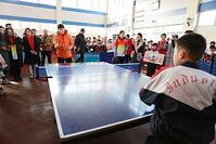 Olympic champion Ma Long visited Liangzou Primary School in Zouping, Shandong Province, to interact with students and teach them his skills. [IMC111460093]